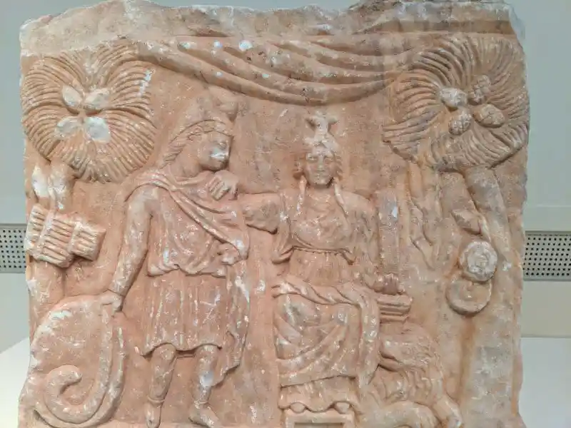 Marble relief of Rhea-Cybele enthroned with Attis from a taurobolic altar